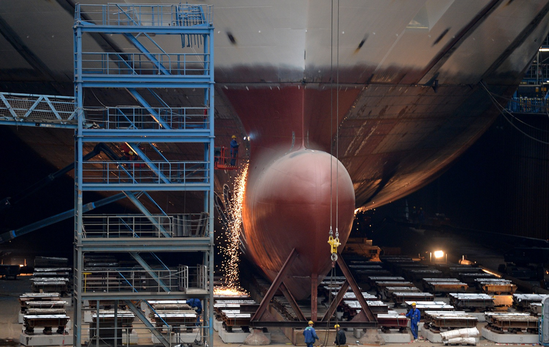 Illustration for article titled Journey Inside the Cavernous Interiors of these Mega-Factories